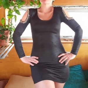 Glittery black dress with metal spikes
